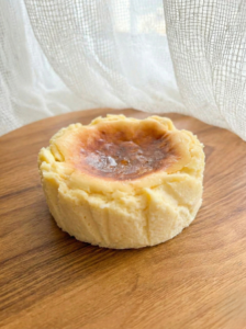 Soft and creamy Basque cheesecake side view with rustic texture