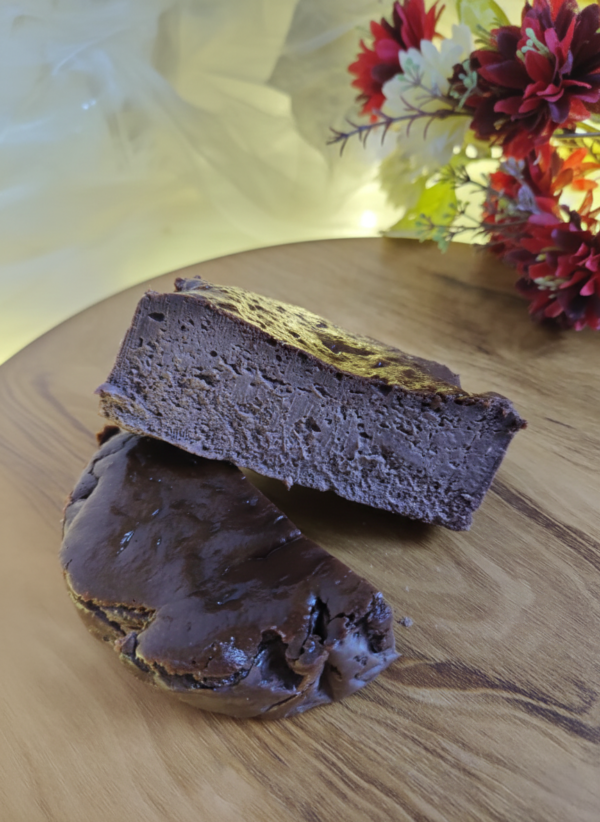 Premium chocolate basque cheesecake side view with soft creamy texture