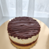 Chocolate cheesecake with rich chocolate drizzle topping and creamy base