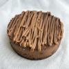 Chocolate cheesecake with rich chocolate drizzle topping and creamy base