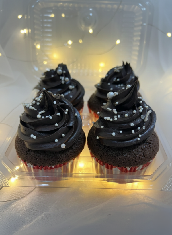 Soft chocolate cupcakes topped with creamy chocolate frosting and sprinkles