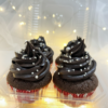 Chocolate cupcakes with rich chocolate frosting and sprinkles in a box