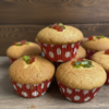 Soft and fluffy vanilla cupcakes with light golden top in paper liners
